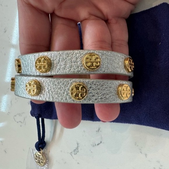 Tory Burch Wrap Around Silver Leather Bracelet.
Color: Silver - Picture 2 of 4